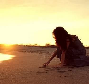 DISEGNARE SULLA SABBIA